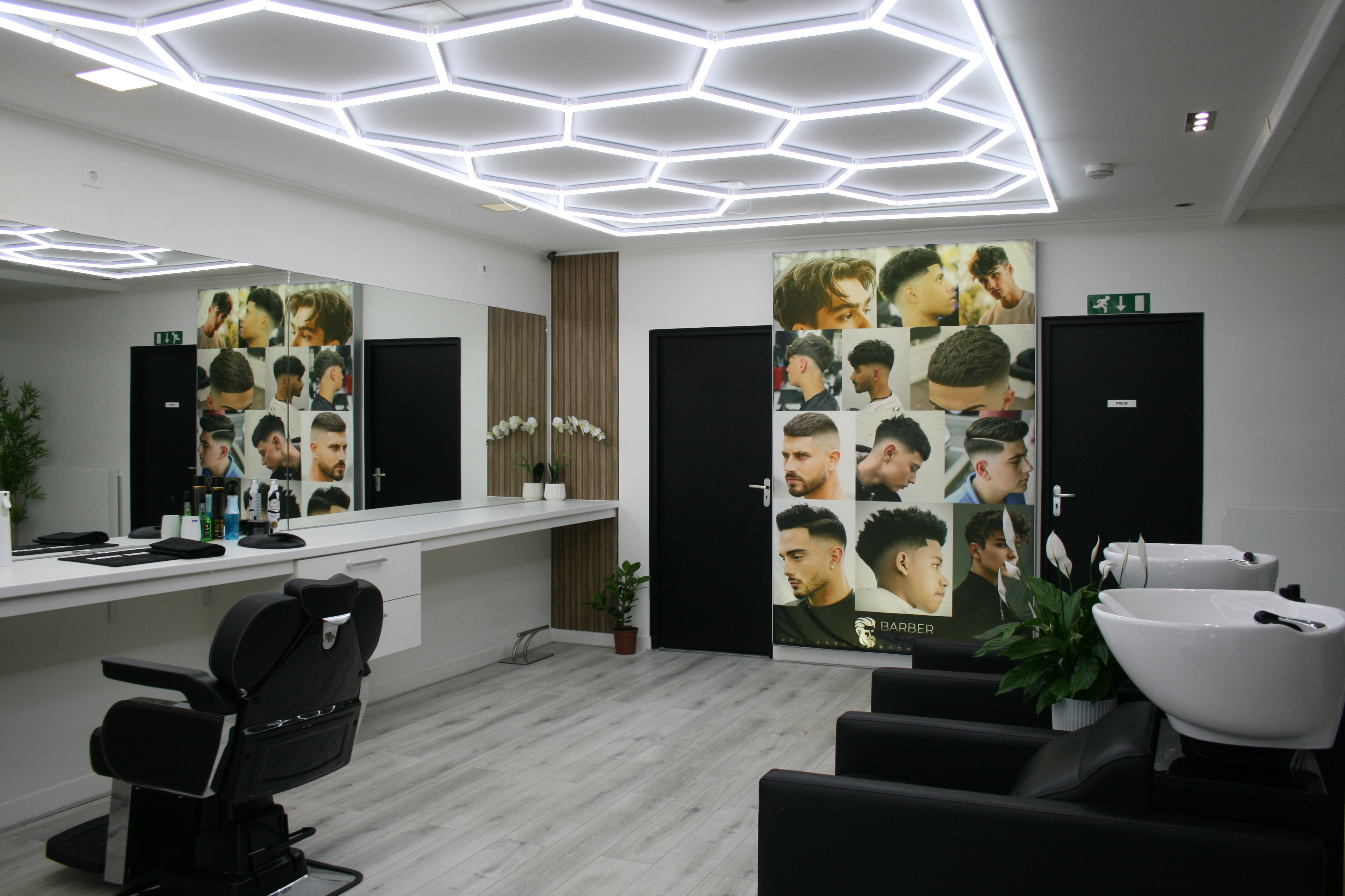 Barber working with a client